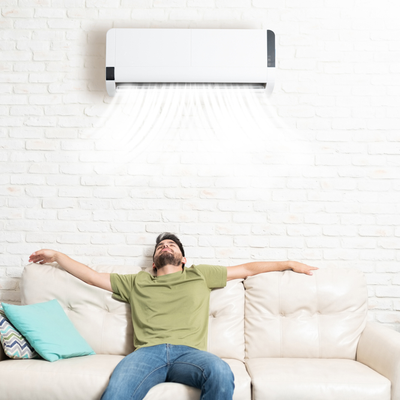 Man relaxing with Air conditioning on